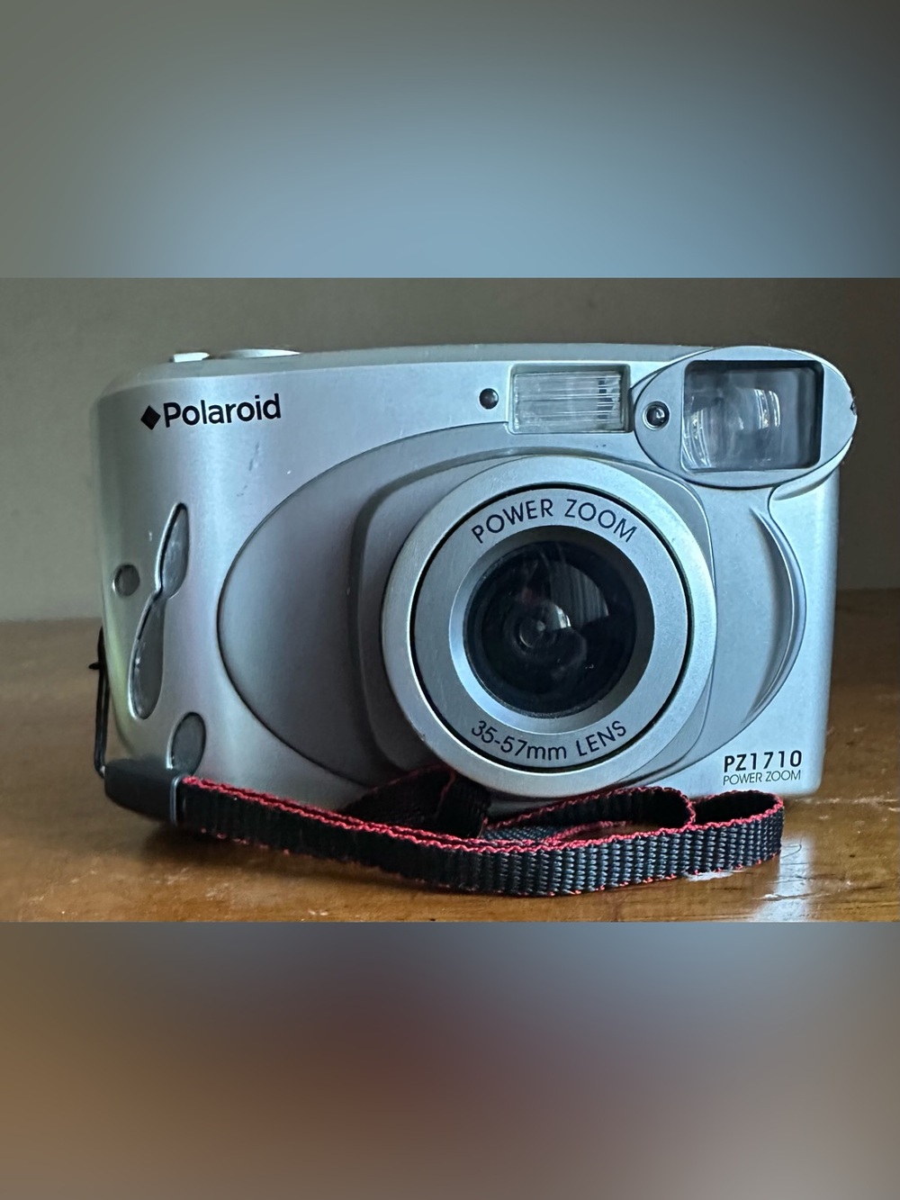 Polaroid Silver Point-and-Shoot Camera with Red-Trim Strap